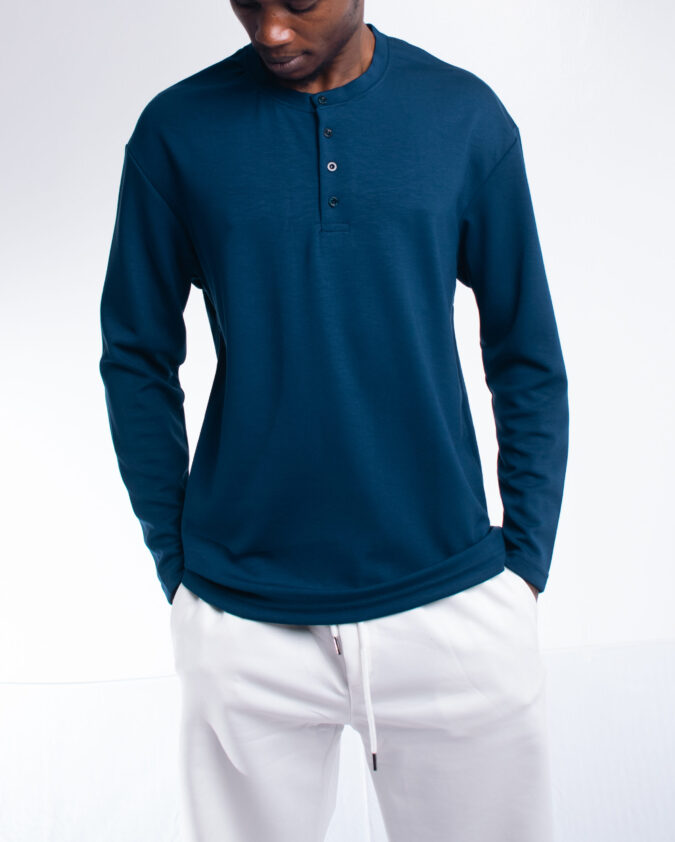 Blue Buttoned crew shirt.