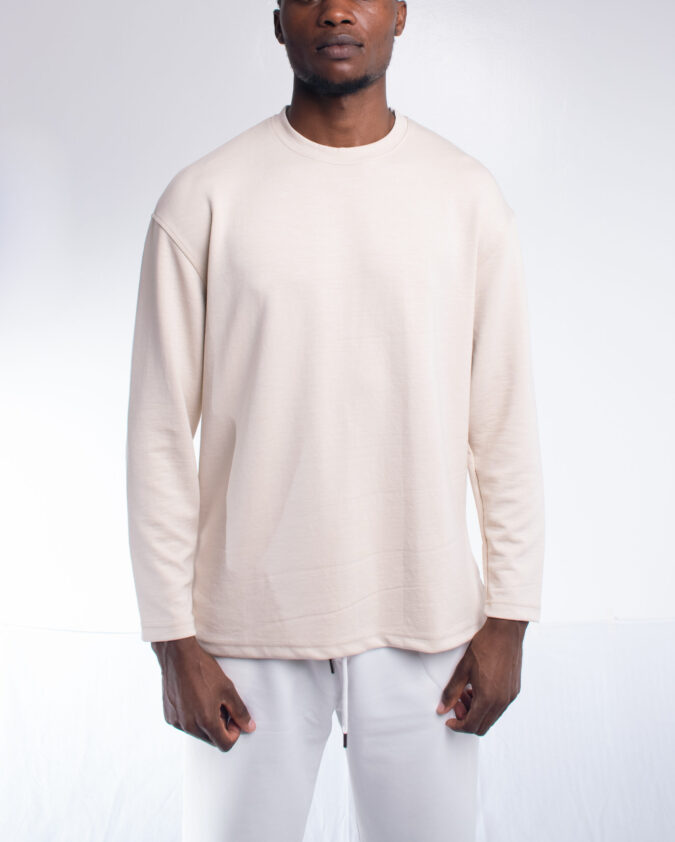 Cream long sleeved shirt